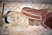 Bagan Myanmar. Sulamani temple. Large painted reclining Buddha. 